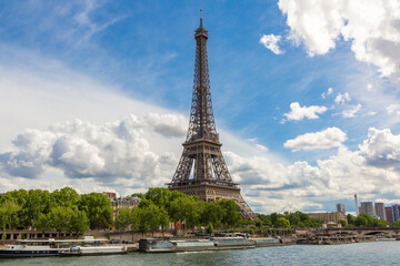 Fototapeta na wymiar Eiffel tower and Seine river in Paris, France