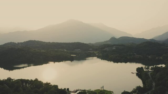 Drone orbit shot over Lake Sirio in Ivrea