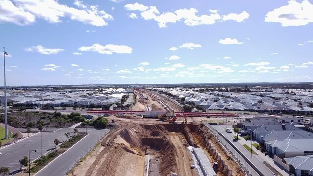 Aerial Pull Back View Of Road Over Rail Construction Works, Yanchep Rail Extension Near Butler