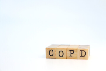 COPD word on cubes. Lung problems concept.