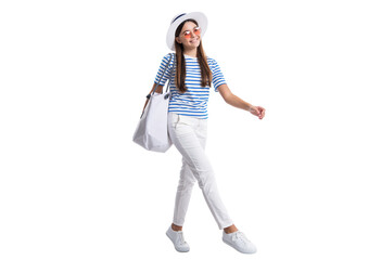 photo of walking teen girl in summer style. teen girl in summer style isolated on white.