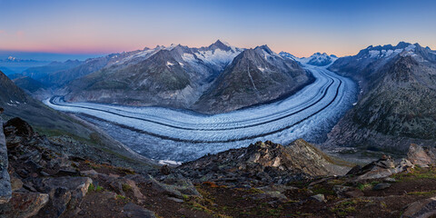 Beautiful panorama of the Aletsch glacier in the Switzerland mountains at sunset.