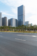 Empty urban road and buildings in the city - 630195047