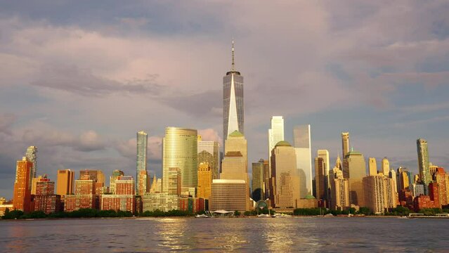 New York Manhattan Cityscape NYC. New York Manhattan time laps at dusk. Timelapse Sunset in New York Lower Manhattan Financial District Hudson River. From New york with love