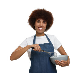 Happy young woman in apron holding bowl and whisk on white background