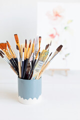 Set of painting brushes for artists. Craft artistic background. Recomforting, destressing creative hobby, art therapy