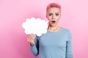 Photo of confused offended girl with short hair dressed blue sweatshirt holding mind cloud staring...