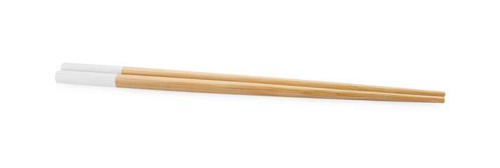 Pair of wooden chopsticks isolated on white