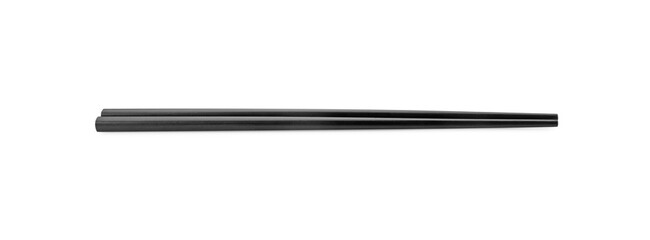 Fototapeta premium Pair of black chopsticks isolated on white