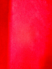 Vivid bright red cloth background or texture pattern.