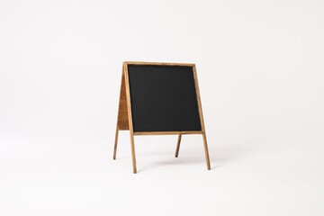 Black sign in wooden frame and copy space on white background