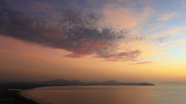 Haitang bay sunrise by the sea. Haitang Bay, located in Sanya, Hainan Province, is a famous resort bay in China.