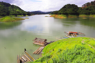 Landscape view of reservoir with water and mountain in Laos.