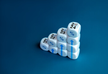 2024 year number with target icon on the top of white blocks as graph steps with percentage icon...