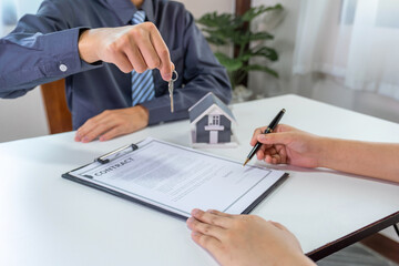 Real estate agents and buyers discuss signing a business contract, renting, buying, mortgage, loan or home insurance