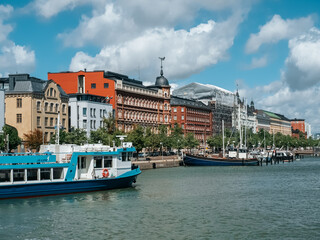 Obraz premium Helsinki, Finland - 07 04 2023: Tourist pleasure boat on the embankment in the center of Helsinki