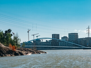 Fototapeta na wymiar Helsinki, Finland - 07 04 2023: Residential buildings on the waterfront of Helsinki 