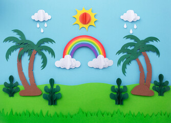 Rain and shine create rainbow made of paper cut. Paper art landscape background. creative minimal concept.