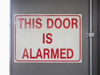 alarmed door sign