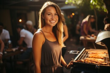 Fototapeta na wymiar Portrait of happy young woman barbecuing at park. Garden party outdoors with drinks, friends social concept.
