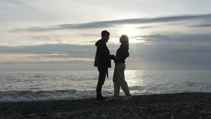 Young couple hugging and kissing