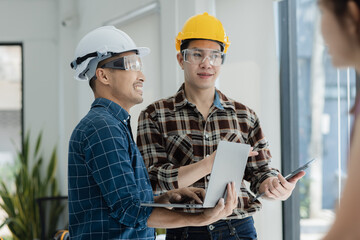 Asian engineer team and architects working designing planing of project, Home renovation concept.  