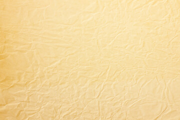 yellow crumpled Old paper texture background.