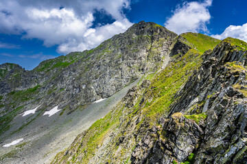 Mount Vanatarea lui Buteanu. Summer landscape of the Fagaras Mountains, Romania. A view from the hiking trail near the Balea Lake and the Transfagarasan Road.