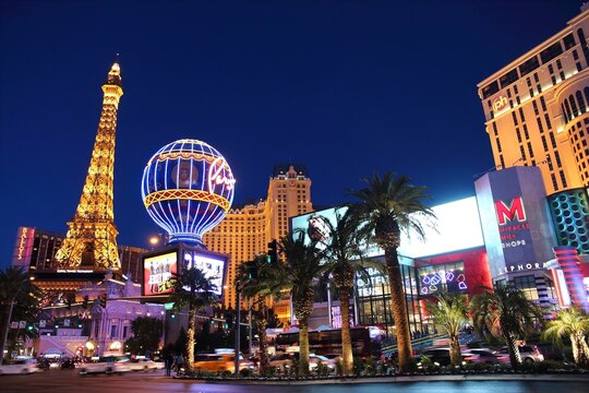 LAS VEGAS, USA - APRIL 14, 2014: People visit Paris Las Vegas casino hotel in Las Vegas. The hotel is among 30 largest hotels in the world with 2,916 rooms.