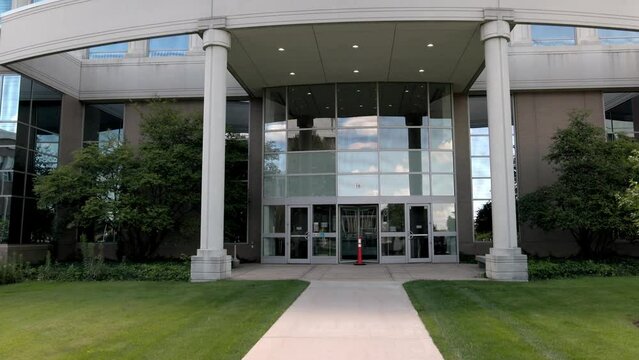 Oakland County Courthouse in Michigan with gimbal video walking towards doors.
