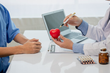 Male patient consulting medical specialist at hospital Chest pain and heart disease concept