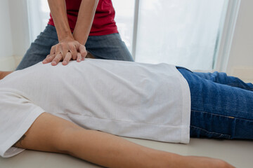 Emergency first aid CPR for men with a heart attack or shock. health care concept