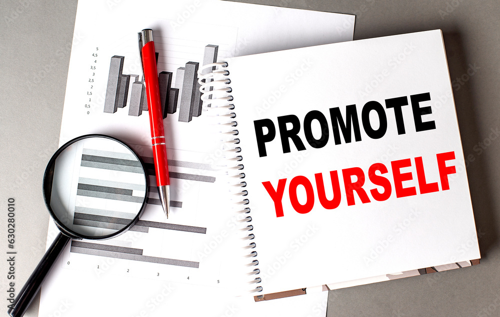 Poster promote yourself text written on notebook with chart