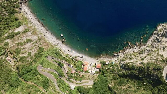 Small bay with people at the sea