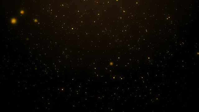 Gold particles abstract background with shining golden particle stars dust. Beautiful futuristic glittering in space on black background.