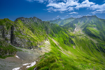 Summer landscape of the Fagaras Mountains, Romania. A view from the hiking trail near the Balea Lake and the Transfagarasan Road.