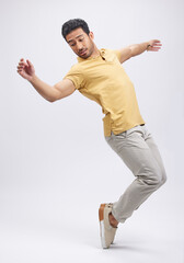 Dance, movement and man on toes in studio for freedom, energy and performance. Creative, training and isolated male person balance, moving and in action pose for a dancer on mockup, white background - obrazy, fototapety, plakaty