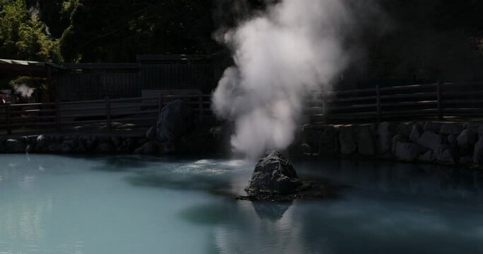 Pond with turquoise color in Kamado jigoku cooking pot hell Beppu Japan