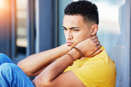 Thinking, man and outdoor of home with stress and guy feeling depression and frustrated. Sad, grief and mental health of a male person with anxiety and tired from mistake and fail contemplation