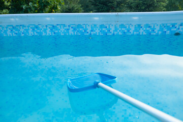 Fototapeta na wymiar Swimming pool cleaning equipment. Service and maintenance of the pool.