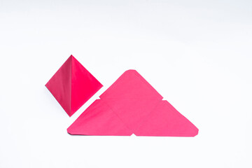 Build a triangular prism out of paper