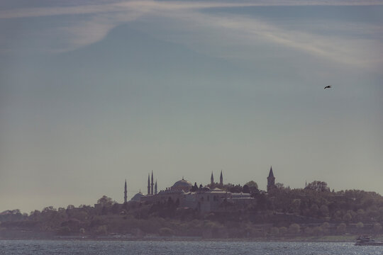 View of the Topkapi Palace and the Blue Mosque in Sultanahmet district on the Bosphorus Strait European side in Istanbul, Turkey.