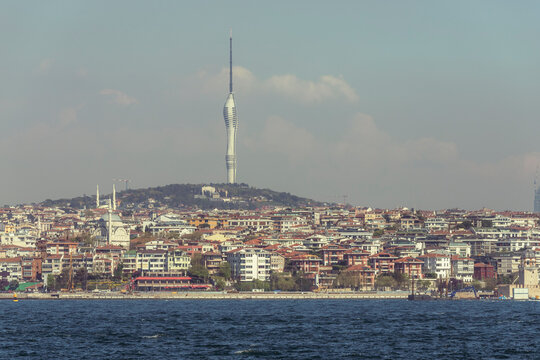 View of the Camilla Tower on the hilltop along the Bosphorus coastline Asiatic side of Istanbul, Turkey.