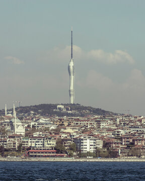 View of the Camilla Tower on the hilltop along the Bosphorus coastline Asiatic side of Istanbul, Turkey.