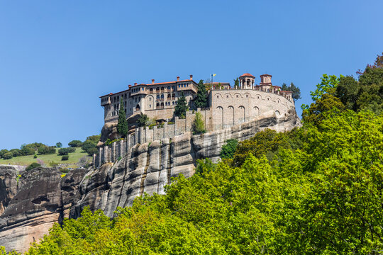 View of Iera Moni Barlaam Monastery on a natural pillar rock formation in Meteora, Trikala, Thessaly, Greece.