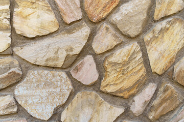 The texture of the stone wall. Old stone wall texture background