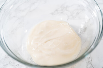 Homemade royal icing for decorating heart-shaped sugar cookies