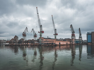 Helsinki, Finland - 07 06 2023: Cranes at the dock on the waterfront of Helsinki