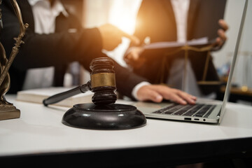 Partner lawyers or attorneys discussing a contract agreement. Successful businessmen have a contract in place to protect it,signing of modest agreements form in office