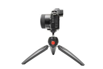 Mirrorless camera on a tripod for live or streaming, mockup camera isolated with clipping path on transparent background